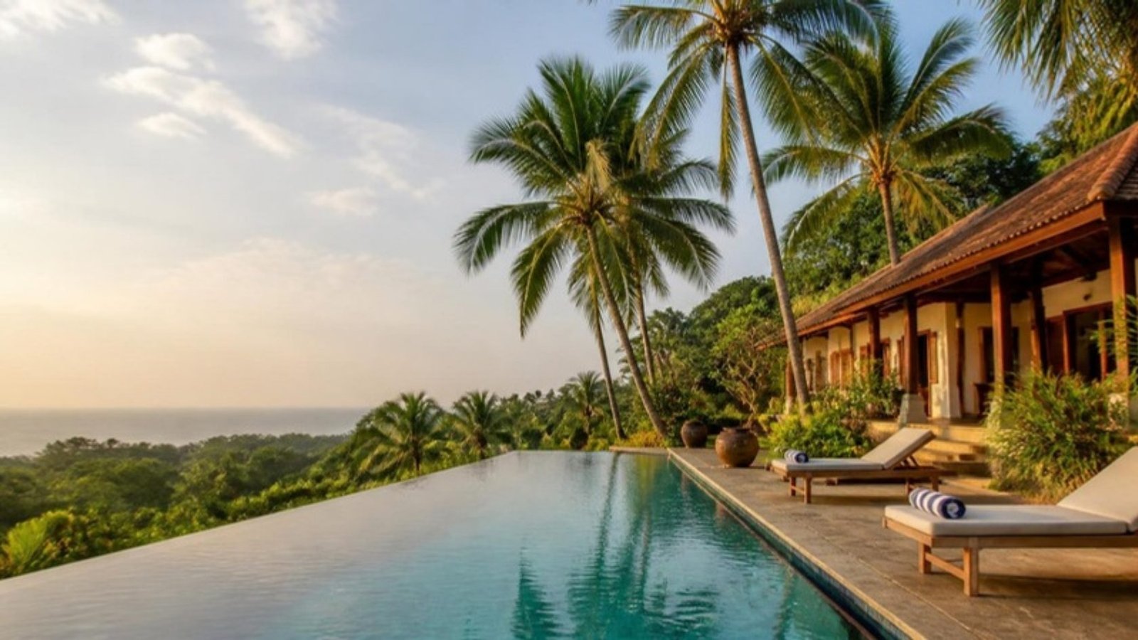 Villa infinity pool overlooking tropical greenery in Sri Lanka
